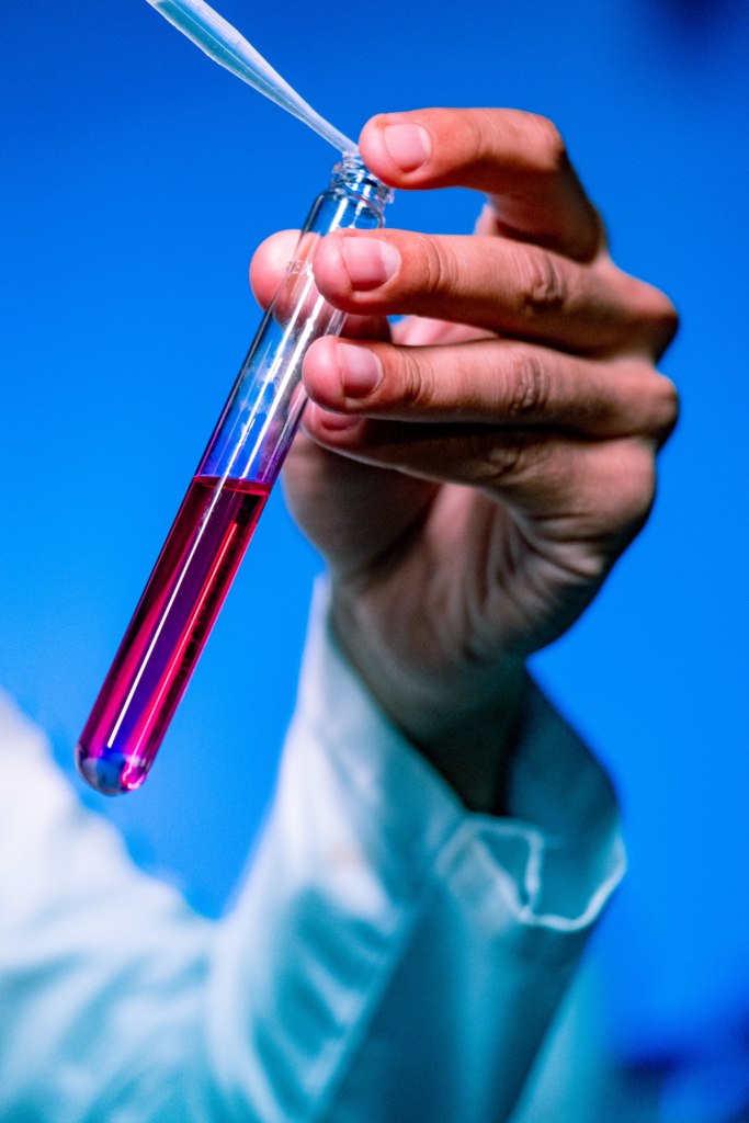 Laboratory quality control testing tomato paste for Brix, pH, and food safety standards