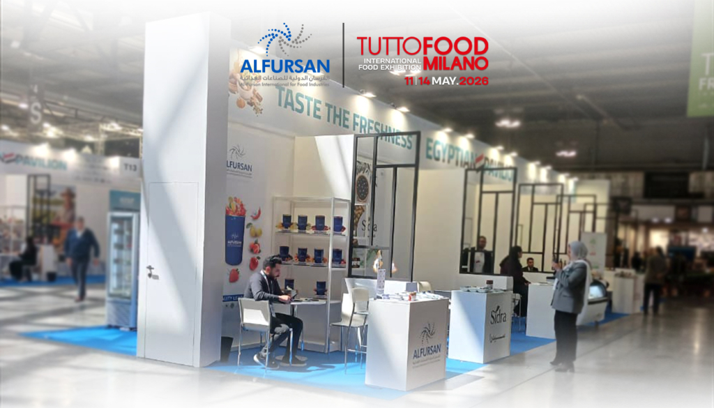 Al Fursan International for Food Industries at Tutto Food Milano 2026 – Hall 4, Stand T13 Al Fursan International for Food Industries exhibition stand at Tutto Food Milano 2026, Hall 4 Stand T13, featuring the slogan "Taste the Freshness," product displays of fruit purees and concentrates, and the Egyptian Pavilion signage in the background